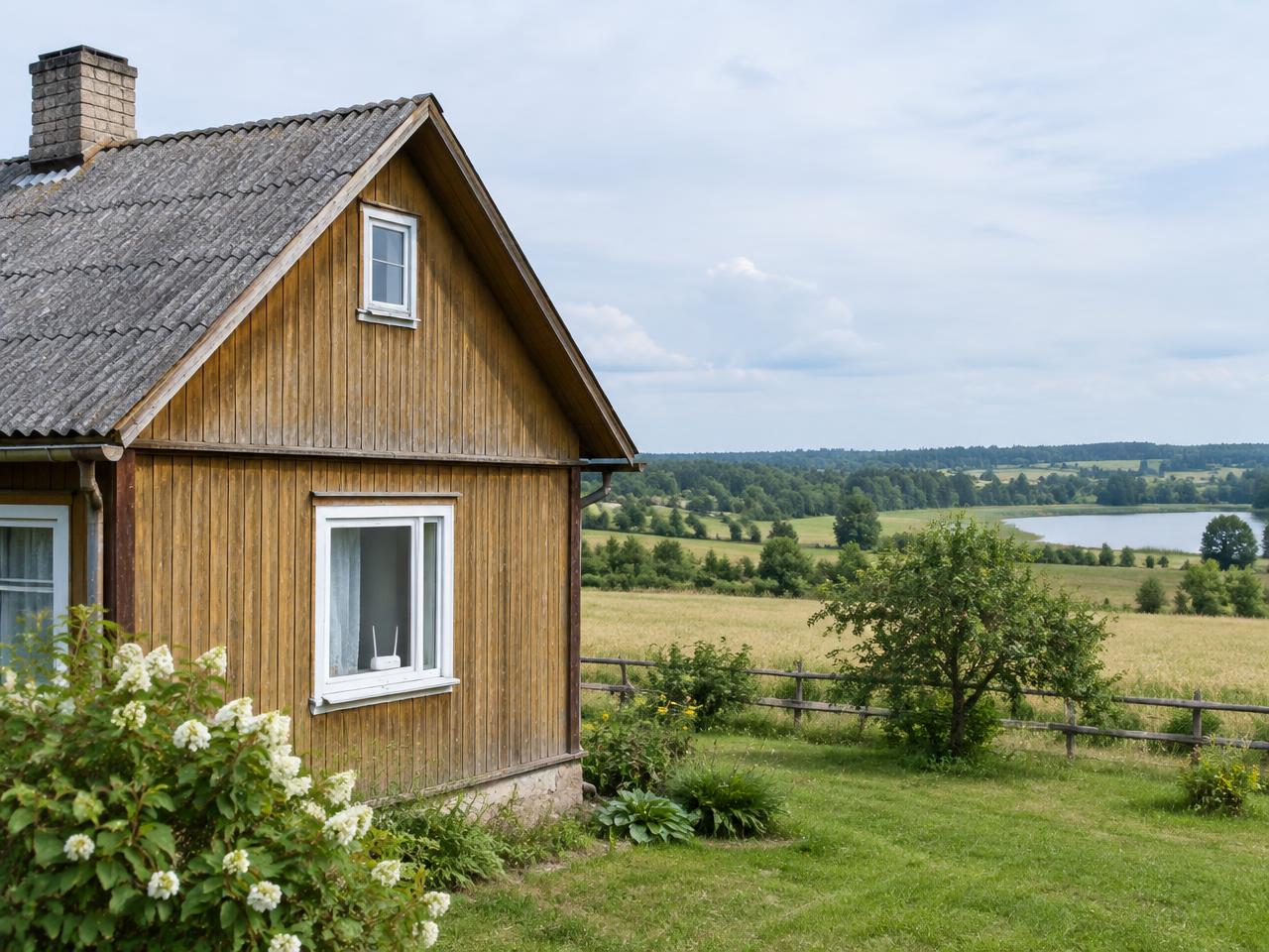 Wooden countryside house with a 5G router on the windowsill